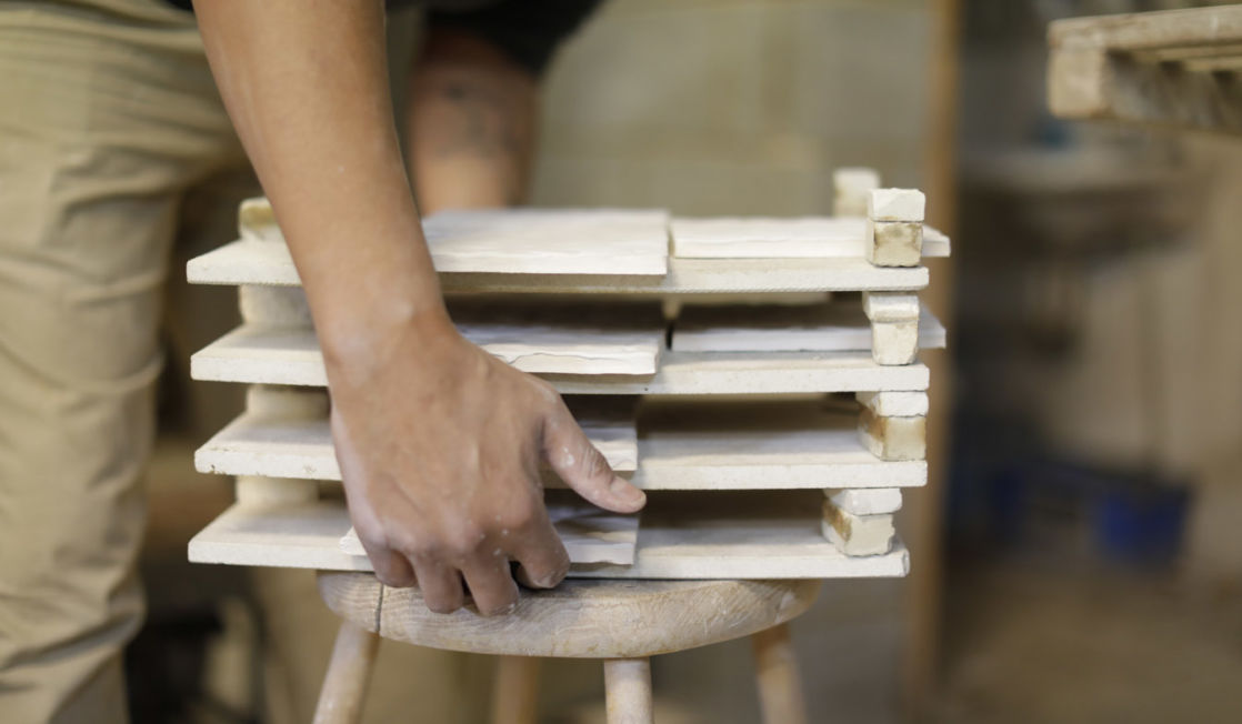 Rich Miller making tiles. Photo Layton Thompson for Ceramic Review